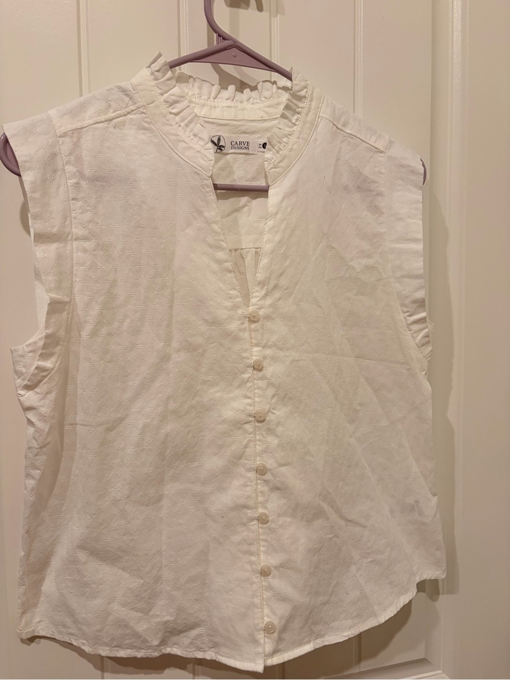 Carve Designs Ivory Sleeveless Ruffle-Neck Button Front Top